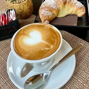 Couette-café Dhome, Palerme